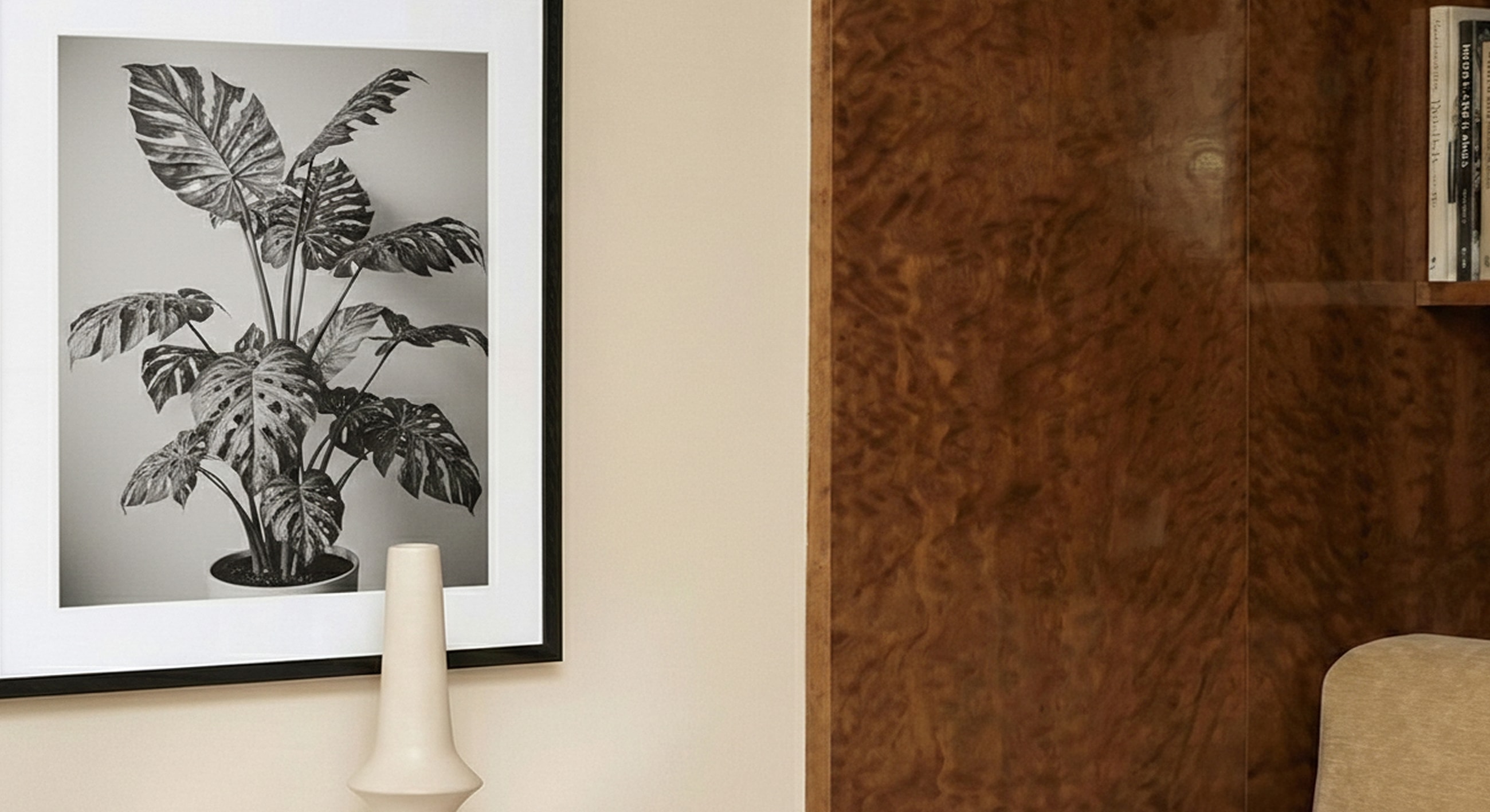 Framed black and white portrait in modern decor.